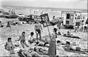 black nude beach group - Puritan picket against too revealing swimwear on a Florida beach, 1985. USA  â€œYou will follow to Hell.â€ [800x513] : r/HistoryPorn